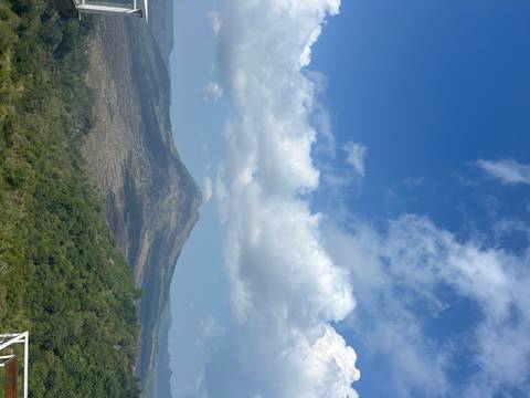 Mountain landscape with blue sky.