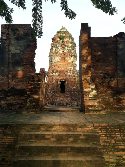 An ancient brick temple with a narrow entrance.