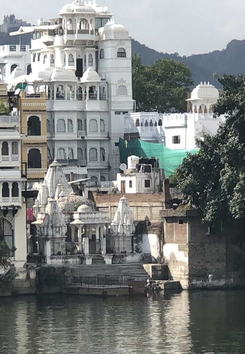       Urban landscape with traditional architecture and construction elements.
  
