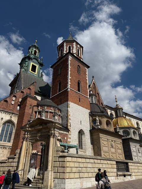       View of a historical church with prominent towers.
  