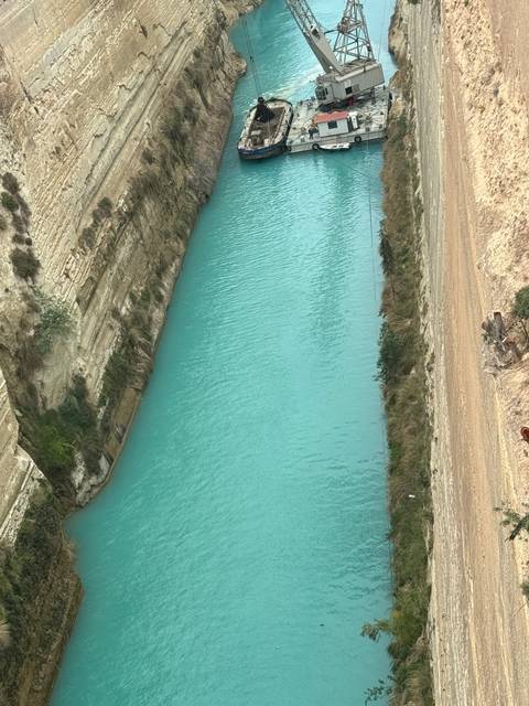       Canal with a ship passing through.
  