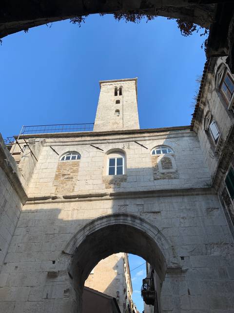 Historic building with a large archway.