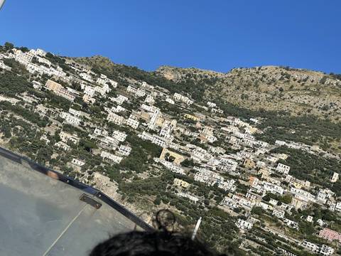       Aerial view of densely packed buildings.
  