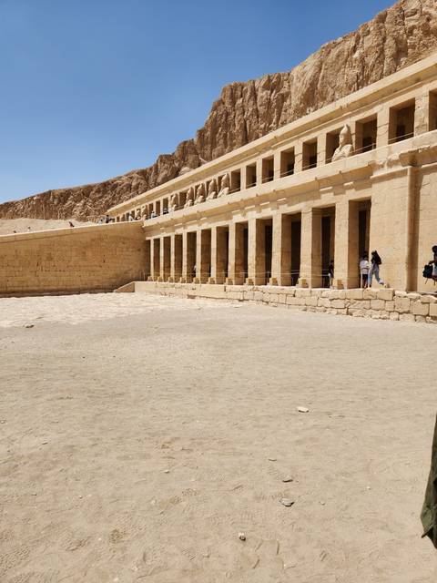 Long colonnade of an ancient Egyptian temple.