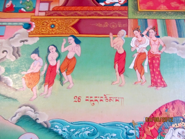       Mural with artistic figures and text.
  