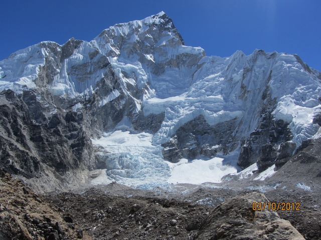       Close-up of a snowy mountain range.
  
