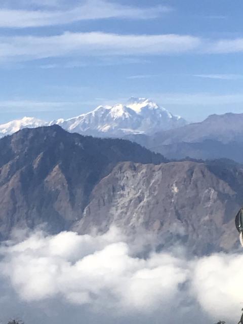       Mountain view with snowcapped peaks.
  