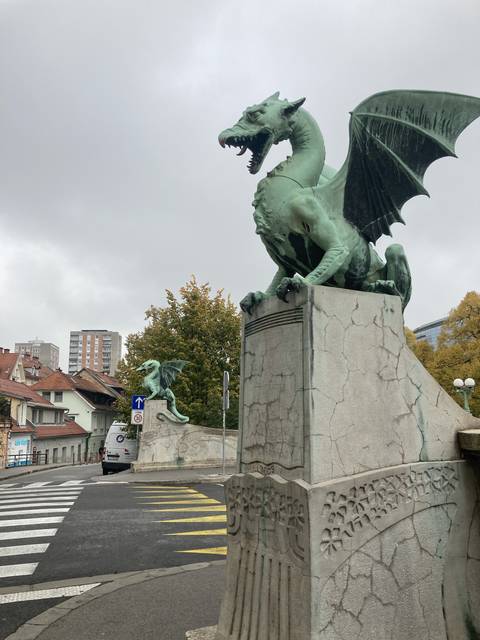       Dragon statue on a bridge in Ljubljana.
  