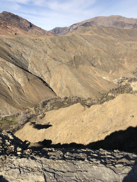 Rocky landscape with barren hills.