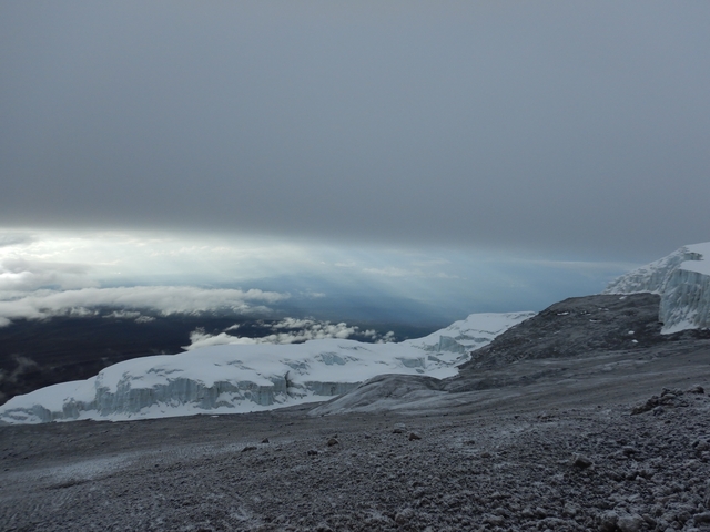       Spectacular view of glacier and cloudy sky.
  