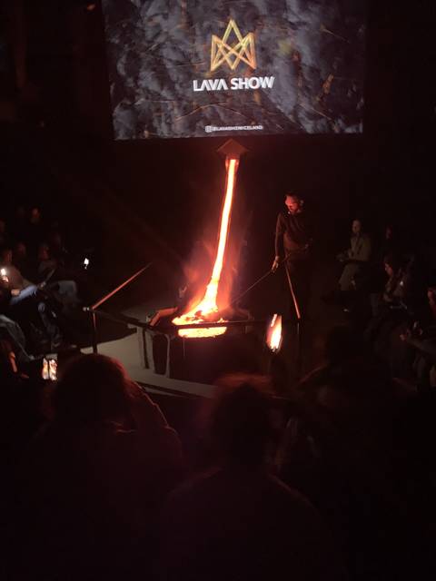 Indoor lava show with molten lava being displayed.