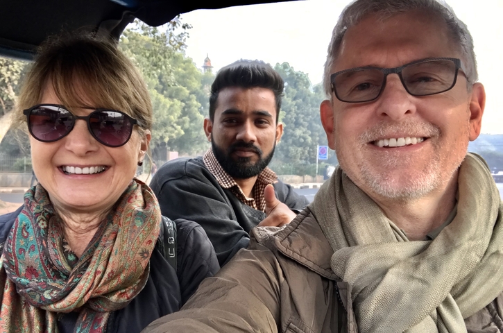       Selfie with three people in a vehicle.
  