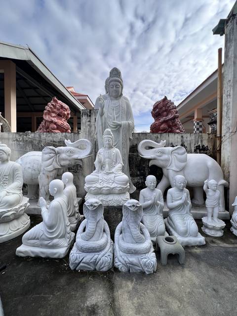 Stone statues depicting cultural figures