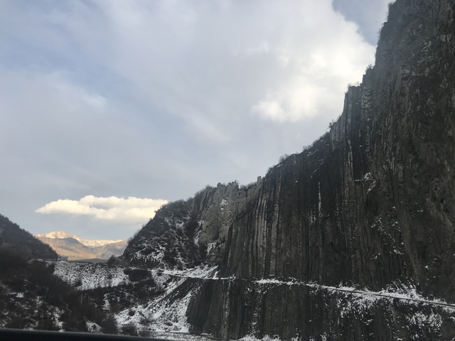       Cliffside with interesting rock formations.
  