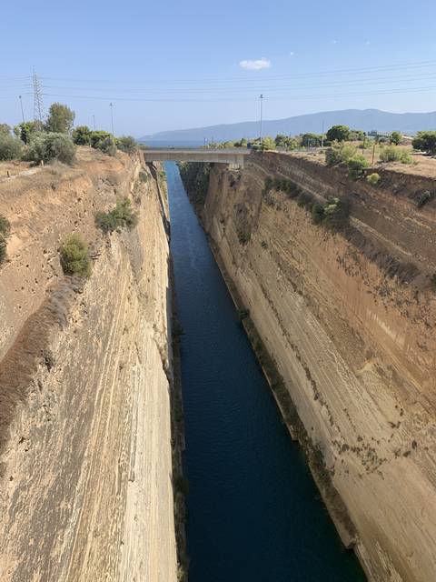       Long canal with steep rock walls.
  