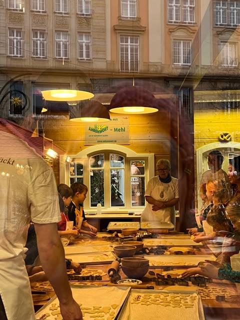       Bakery or shop with people inside
  