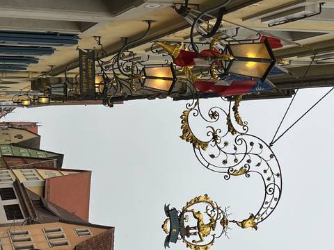 Ornate street lamps and signs