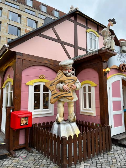 Giant figure with pretzel decoration