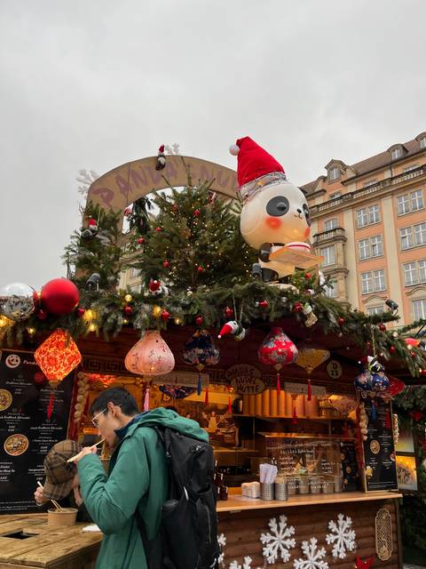 Christmas market stand with a large ornamental display