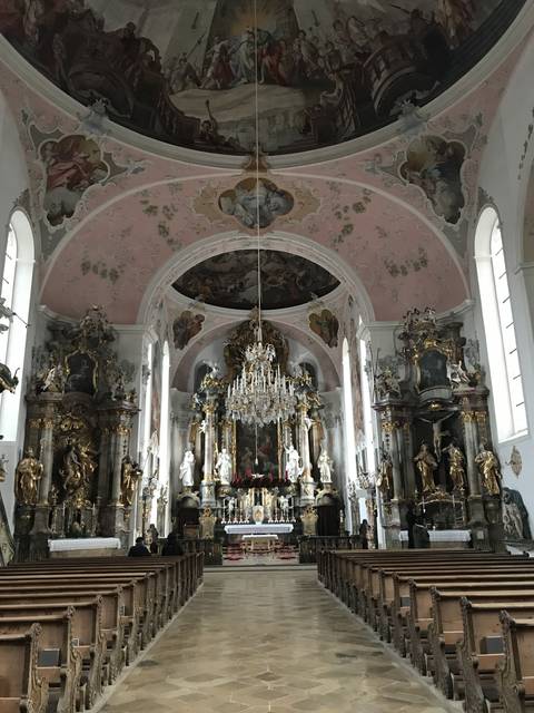       Intricate church interior with decorations.
  