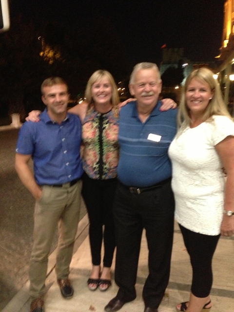 Blurry group photo at night.