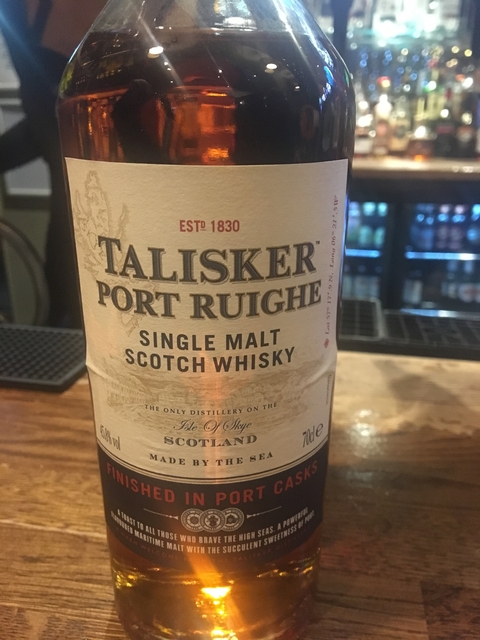 A close-up of a Talisker whisky bottle label.