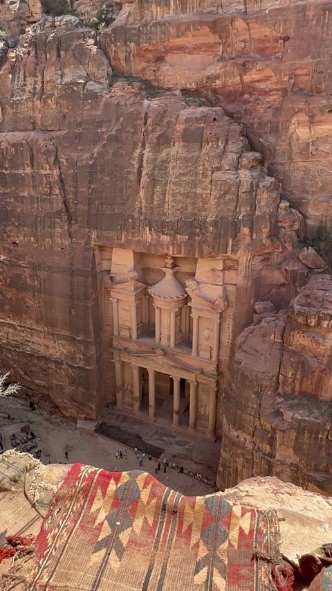 Petra's Treasury carved into rock.