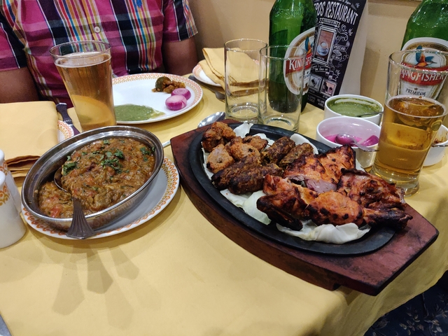       An appetizing spread of Indian dishes on a table.
  