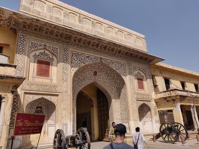       Decorative facade of a historic palace entrance.
  