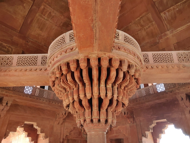       Intricate carvings and architecture of a historical site.
  