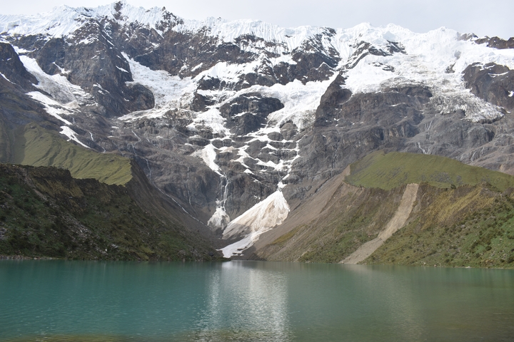Snow-capped mountains and a calm lake