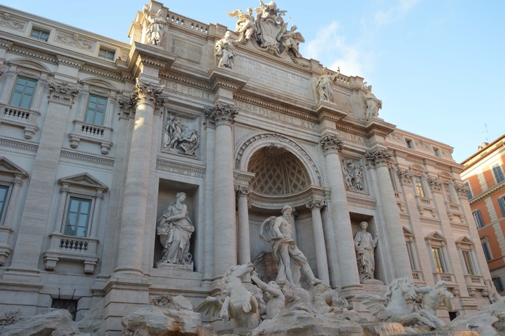 Famous fountain with statues and flowing water