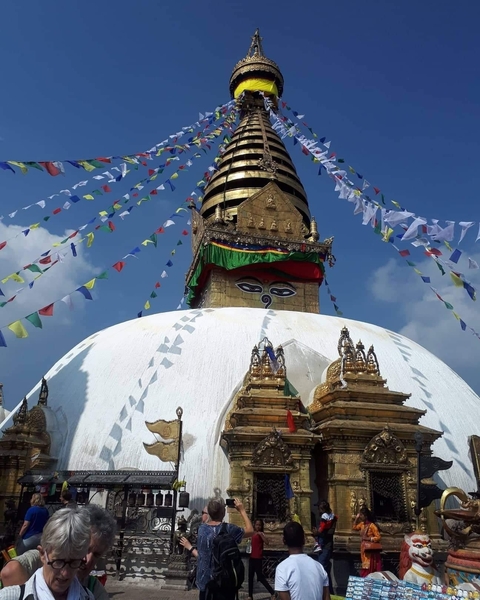 Stupa with prayer flags and Buddha eyes