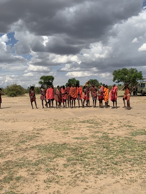 Group of Maasai people in traditional attire.