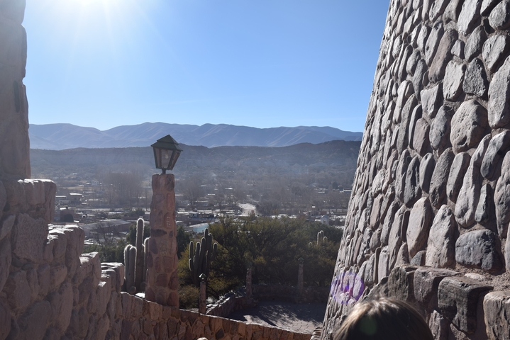 Stone structures with views of a distant valley.