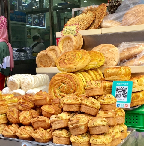 Variety of freshly baked bread on display.