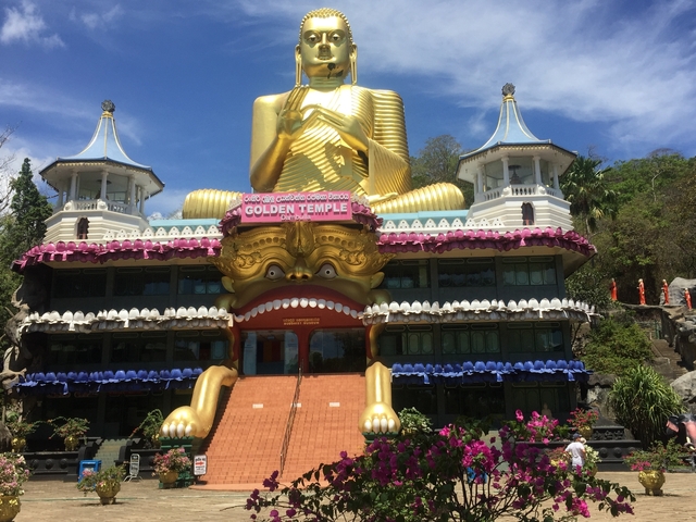 Colorful entrance to the Golden Temple in Dambulla.