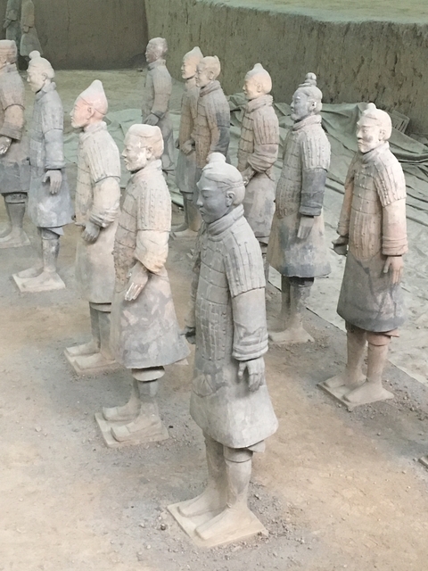       Terracotta Warriors statues in close view.
  