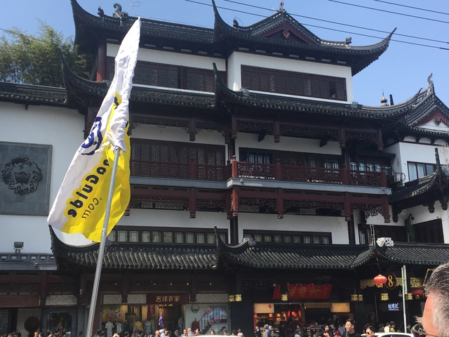 Traditional Chinese building with a flag.