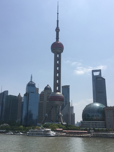       Shanghai city skyline with Oriental Pearl Tower.
  
