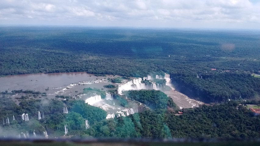 Aerial view of Iguazu Falls with lush greenery