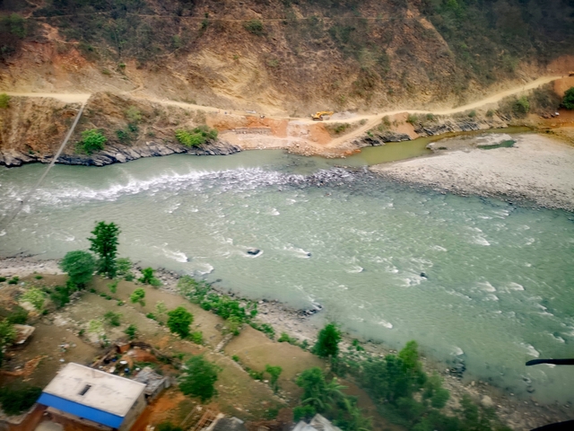       Aerial view of a river and surrounding landscape.
  