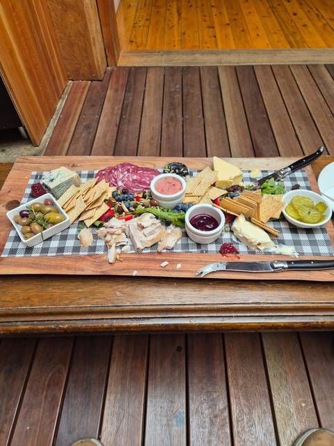 Assortment of food including cheese and meats.