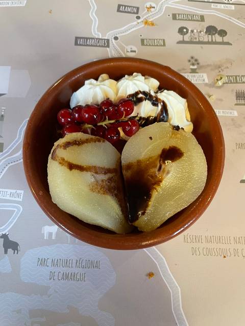 Dessert plate with pears, cream, and red currants.
