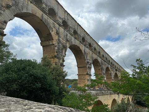 Upside-down image of an ancient aqueduct.