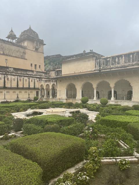 Gardens in front of an ancient fort.