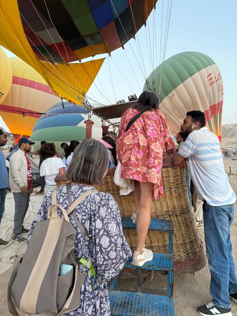 People preparing for a hot air balloon ride.