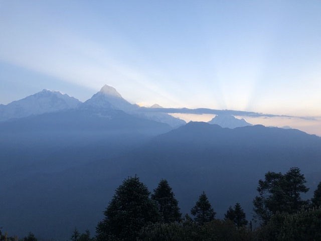       Mountain landscape at sunrise with mist
  