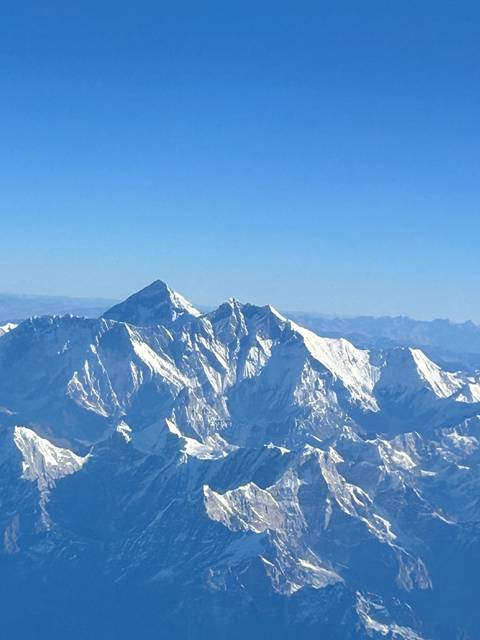       Mountainous landscape with snow-covered peaks
  