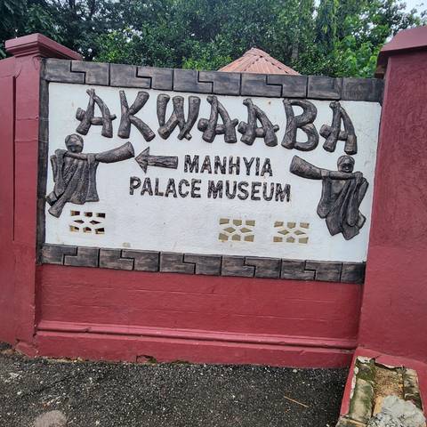       Sign for Akwaba Manhyia Palace Museum.
  